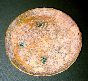 Earthenware moulded dish with yellow glaze, Iraq 9<sup>th</sup> century - source Freer Gallery Smithsonian Washington
